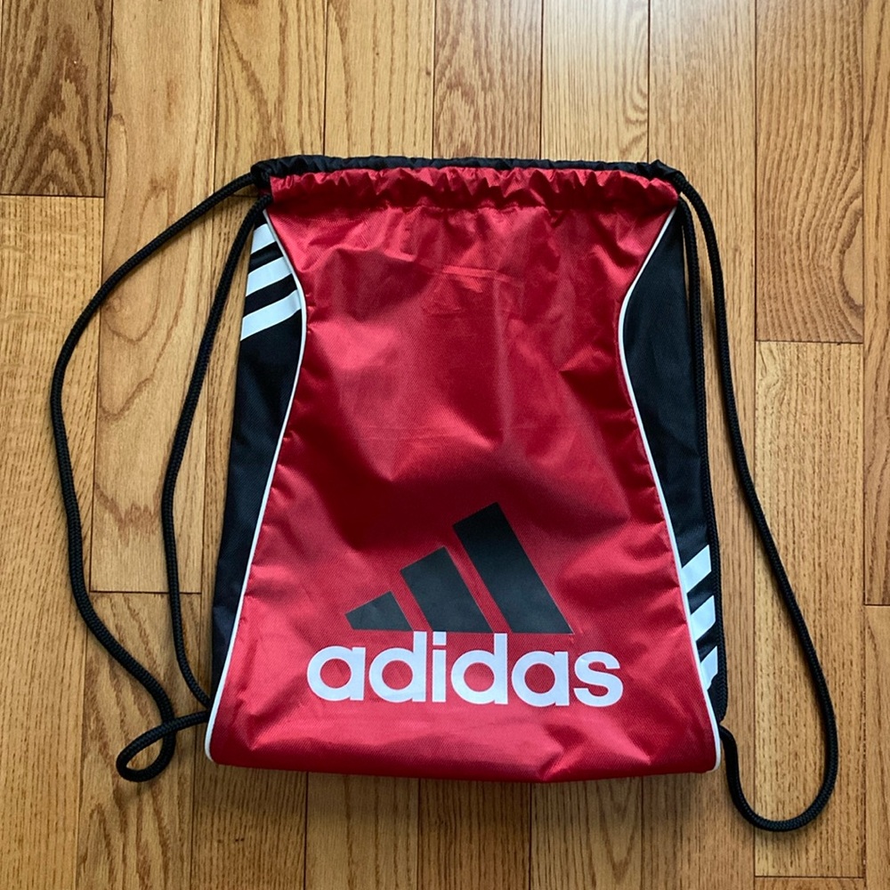 Adidas red and black drawstring backpack